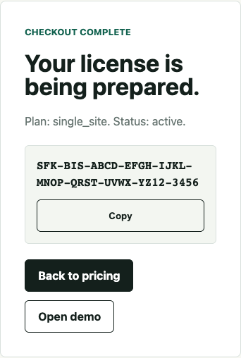 StoreFixKit checkout success page showing a license key and copy button